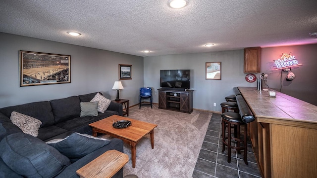 19288 Evenston Dr, Farmington, MN 55024 - living room with a dry bar, a textured ceiling, recessed lighting, baseboards, and dark colored carpet