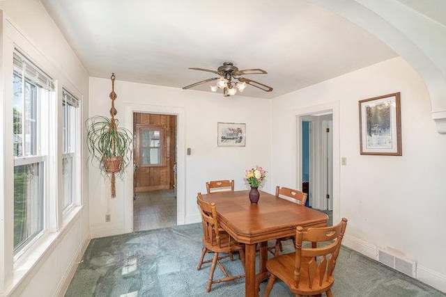 4528 30th Ave S, Minneapolis, MN 55406 - dining space with arched walkways, healthy amount of natural light, and a ceiling fan