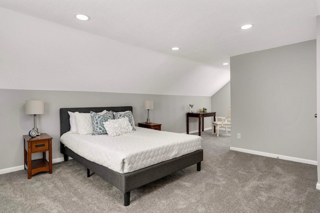 carpeted bedroom featuring lofted ceiling, recessed lighting, and baseboards
