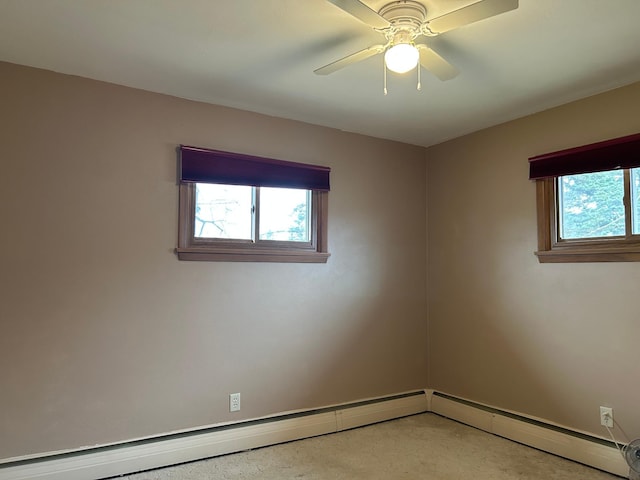 empty room featuring baseboards and a ceiling fan