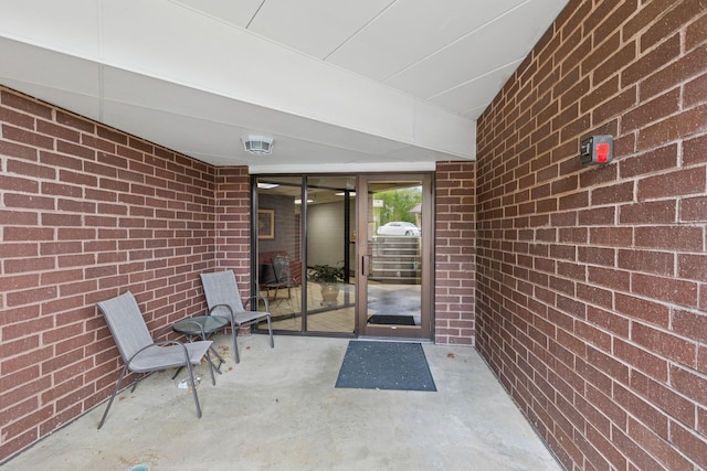 14575 Burma Ave W Unit 202, Rosemount, MN 55068 - property entrance with a patio and brick siding