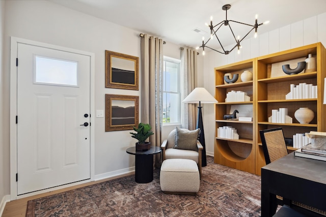 15071 Athgoe Dr, Rosemount, MN 55068 - living area with a chandelier and baseboards