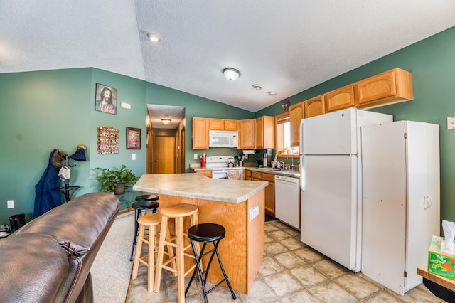 16693 Hightop Way NW, Cass Lake, MN 56633 - kitchen with white appliances, vaulted ceiling, light countertops, a kitchen breakfast bar, and a textured ceiling