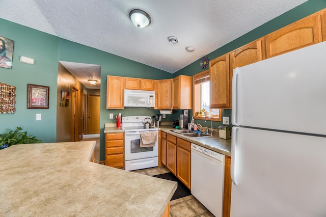 16693 Hightop Way NW, Cass Lake, MN 56633 - kitchen with white appliances, a sink, vaulted ceiling, a textured ceiling, and light countertops