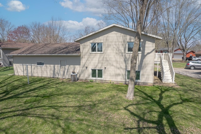 36 Ben Nevis Ln, Waite Park, MN 56387 - view of side of home with a yard, stairway, and cooling unit