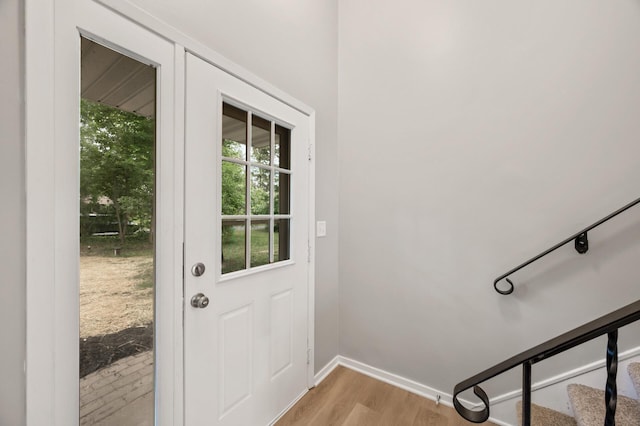 21485 Inwood Ave N, Forest Lake, MN 55025 - entryway with light wood-style flooring and baseboards