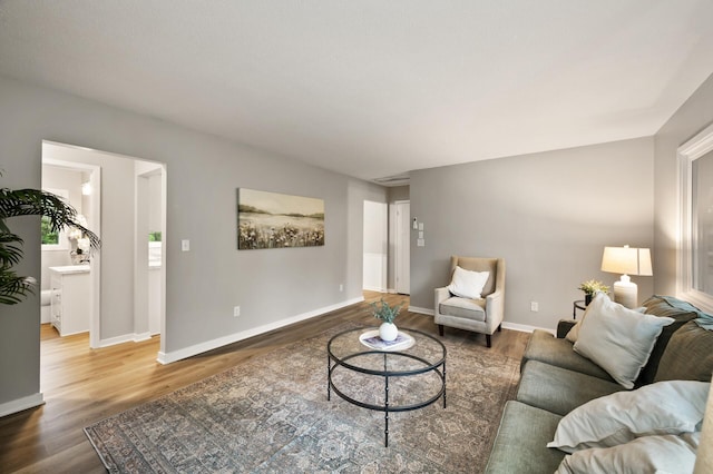 21485 Inwood Ave N, Forest Lake, MN 55025 - living area featuring wood finished floors and baseboards