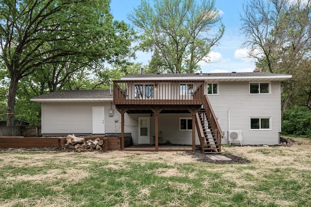 21485 Inwood Ave N, Forest Lake, MN 55025 - rear view of house with a wooden deck, stairs, a lawn, and ac unit