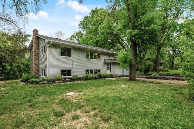 21485 Inwood Ave N, Forest Lake, MN 55025 - back of property with a chimney and a yard