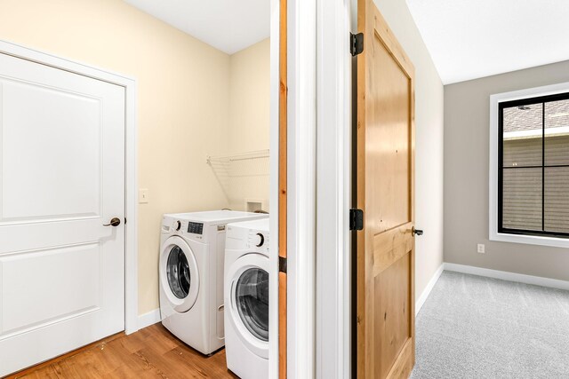 25882 Emerson Ct, Wyoming, MN 55092 - washroom featuring laundry area, washer and clothes dryer, and baseboards