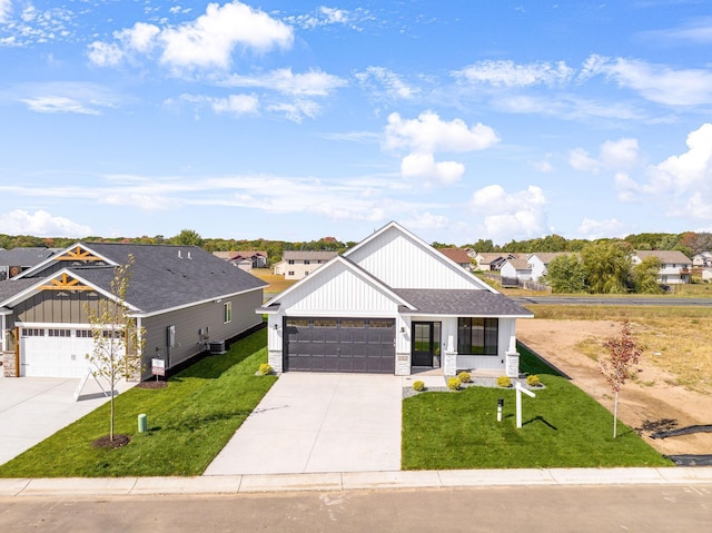 25882 Emerson Ct, Wyoming, MN 55092 - modern farmhouse featuring a front yard, board and batten siding, and driveway