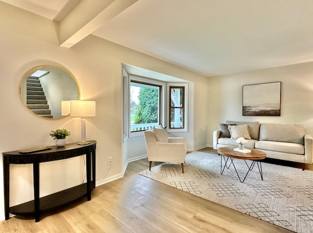 809 Wagon Wheel Trl, Mendota Heights, MN 55120 - living area with light wood-style floors, baseboards, and stairway