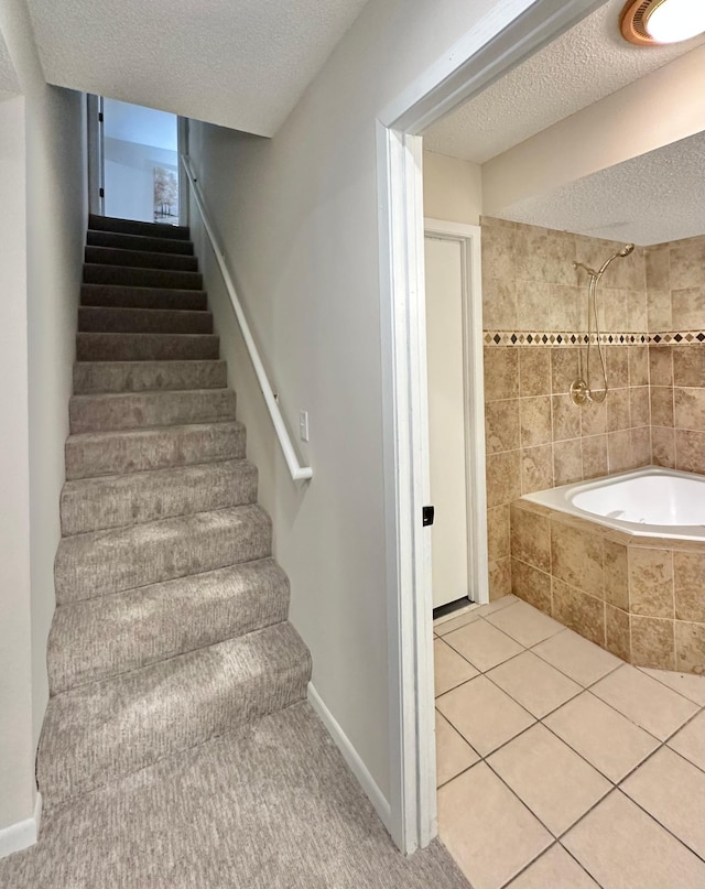 809 Wagon Wheel Trl, Mendota Heights, MN 55120 - stairs with tile patterned flooring and a textured ceiling