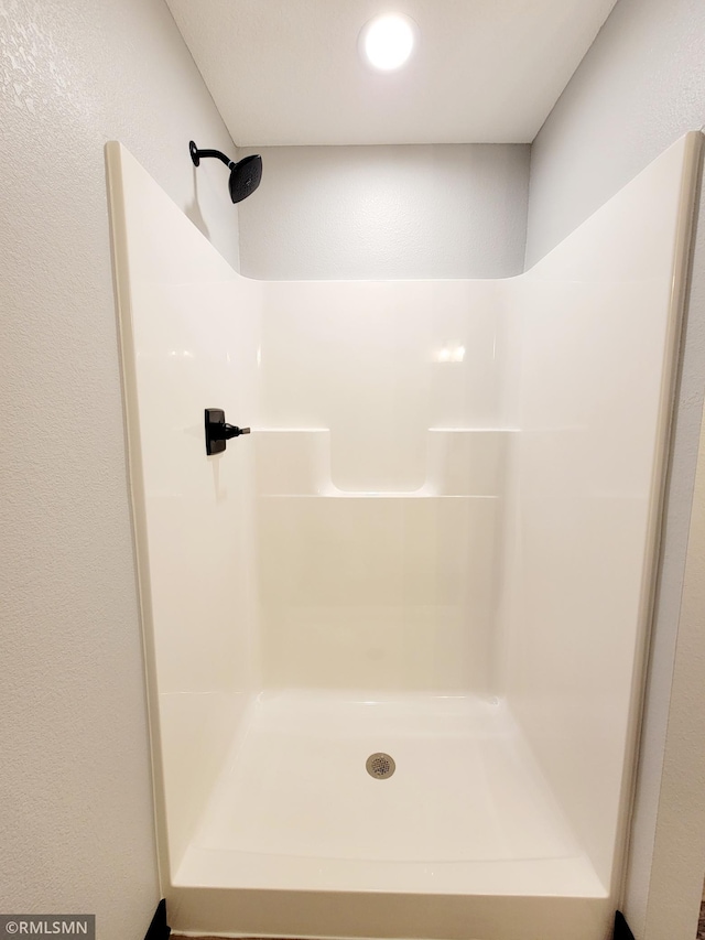 full bath with a shower