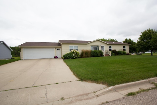 932 Spruce Ave S, Thief River Falls, MN 56701 - ranch-style house with an attached garage, a front lawn, and driveway