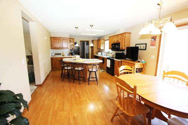 932 Spruce Ave S, Thief River Falls, MN 56701 - dining area featuring light wood-style flooring