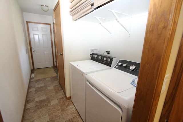 932 Spruce Ave S, Thief River Falls, MN 56701 - washroom with stone finish flooring and washer and dryer