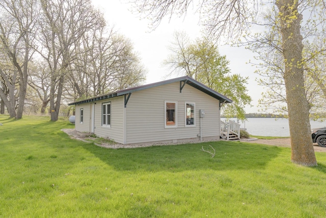43 Blue Stem Rd, Shetek Twp, MN 56175 - view of side of property featuring a lawn and a water view