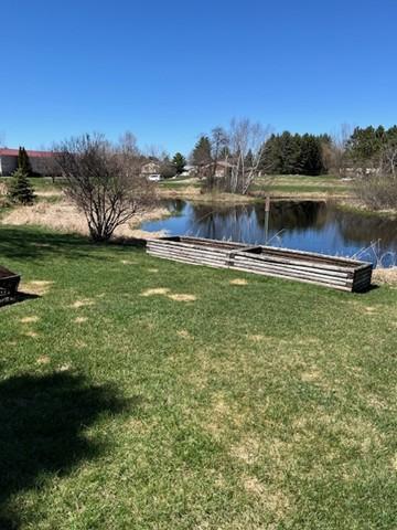view of yard with a water view