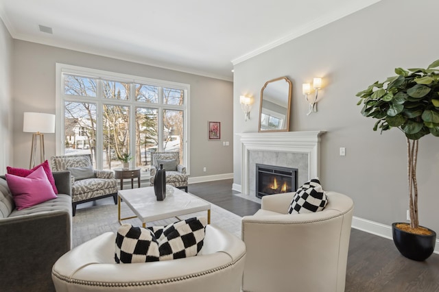 2454 Crowne Hill Rd, Minnetonka, MN 55305 - living room with visible vents, a tiled fireplace, baseboards, dark wood-style floors, and ornamental molding