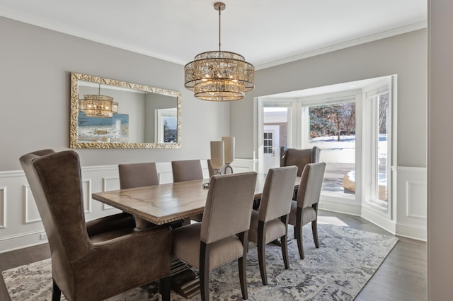 2454 Crowne Hill Rd, Minnetonka, MN 55305 - dining space with wainscoting, dark wood-style floors, a notable chandelier, ornamental molding, and a decorative wall