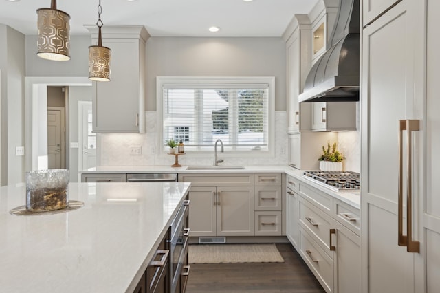 2454 Crowne Hill Rd, Minnetonka, MN 55305 - kitchen featuring a sink, ventilation hood, stainless steel gas cooktop, recessed lighting, and dark wood-style floors