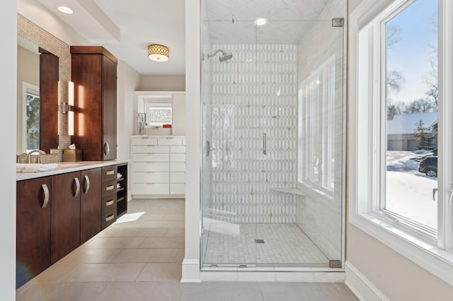 2454 Crowne Hill Rd, Minnetonka, MN 55305 - full bath with plenty of natural light, vanity, tile patterned floors, and a shower stall