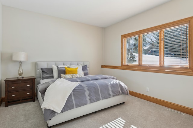 2454 Crowne Hill Rd, Minnetonka, MN 55305 - bedroom featuring baseboards, light carpet, and visible vents