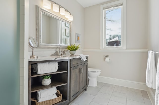 2454 Crowne Hill Rd, Minnetonka, MN 55305 - bathroom featuring vanity, baseboards, and toilet