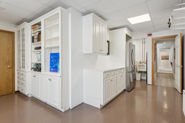 2454 Crowne Hill Rd, Minnetonka, MN 55305 - hall with dark tile patterned flooring and a drop ceiling