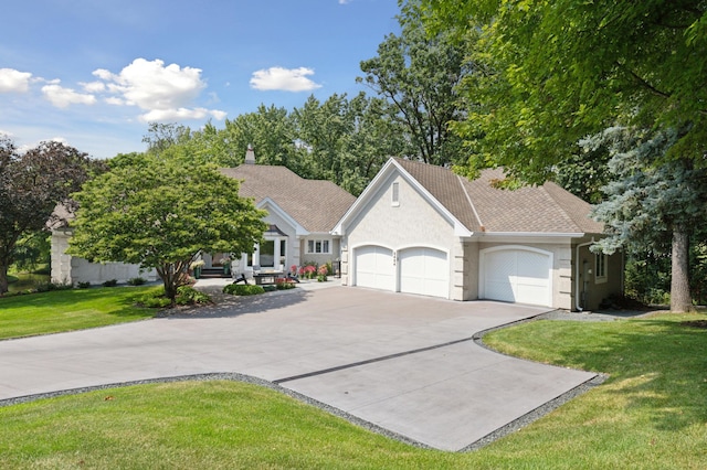 2454 Crowne Hill Rd, Minnetonka, MN 55305 - single story home with driveway, a garage, a front lawn, a shingled roof, and stucco siding
