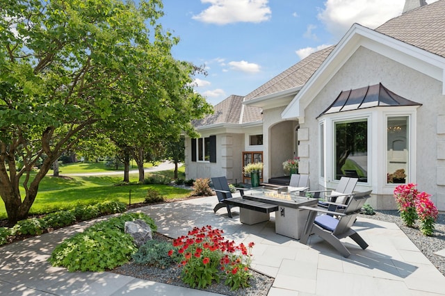 2454 Crowne Hill Rd, Minnetonka, MN 55305 - view of patio / terrace with an outdoor fire pit