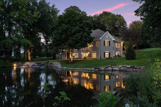 2454 Crowne Hill Rd, Minnetonka, MN 55305 - back of house with a water view and a yard