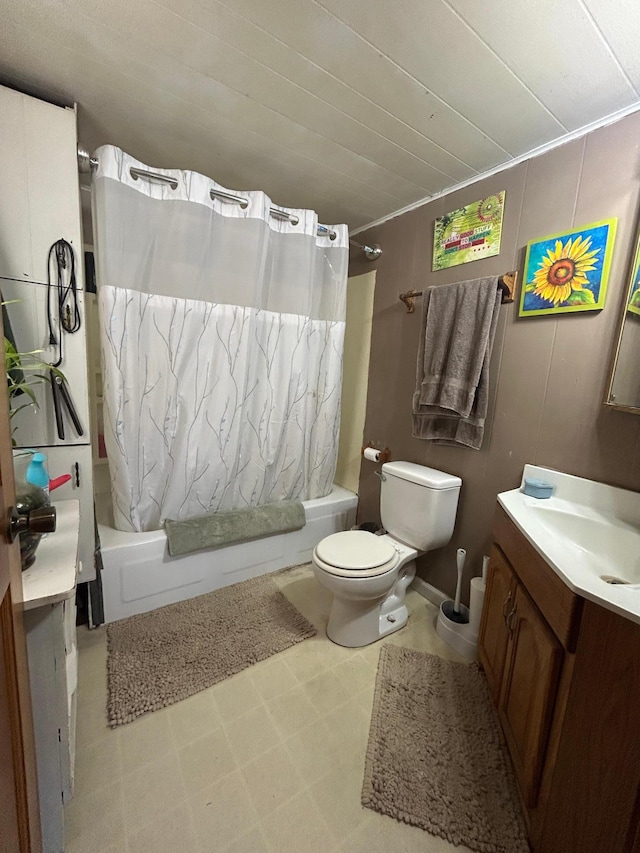 full bath with toilet, shower / tub combo, and vanity