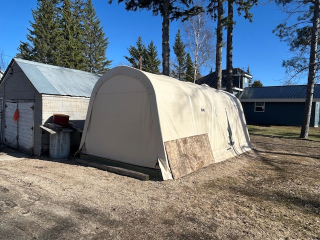 view of outbuilding featuring an outbuilding