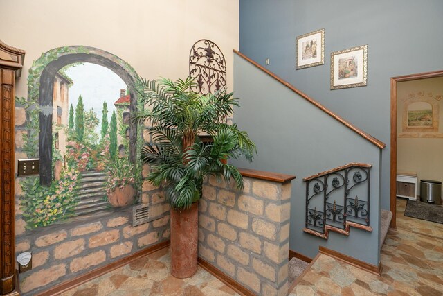 stairway with stone finish floors