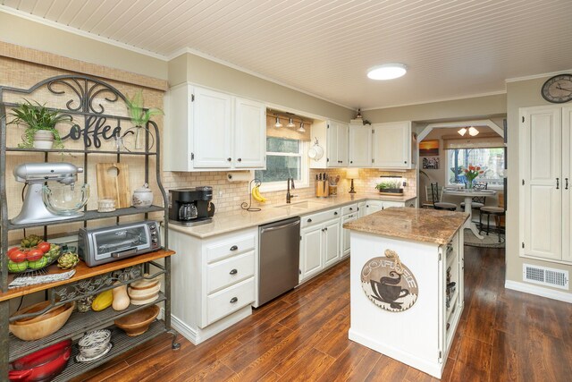 kitchen featuring dishwasher, plenty of natural light, ornamental molding, white cabinetry, and dark wood-style floors
