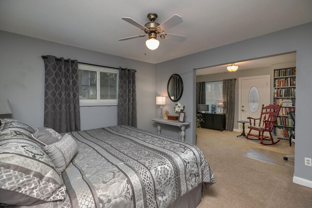 bedroom featuring carpet and a ceiling fan