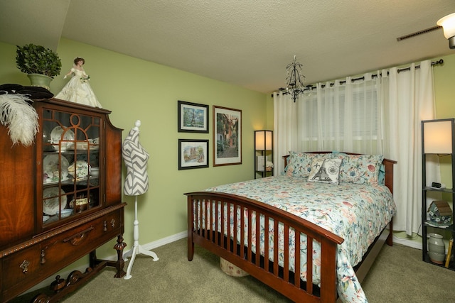 bedroom featuring carpet and baseboards