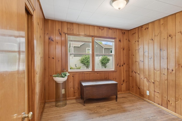 3215 146th St W, Rosemount, MN 55068 - sitting room featuring wood finished floors, wooden walls, and baseboards