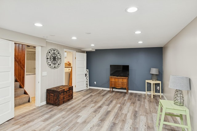 3215 146th St W, Rosemount, MN 55068 - sitting room featuring wood finished floors, stairs, recessed lighting, and baseboards