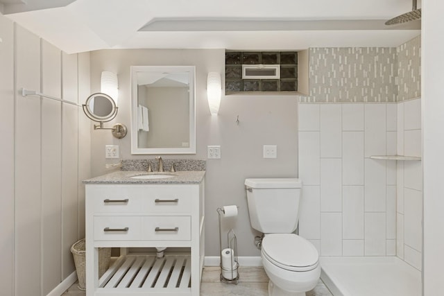 3215 146th St W, Rosemount, MN 55068 - full bath with toilet, tiled shower, vanity, and baseboards