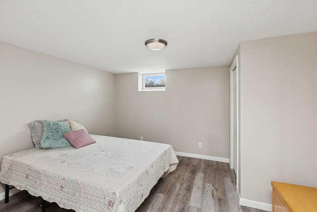 3215 146th St W, Rosemount, MN 55068 - bedroom featuring dark wood-style flooring and baseboards