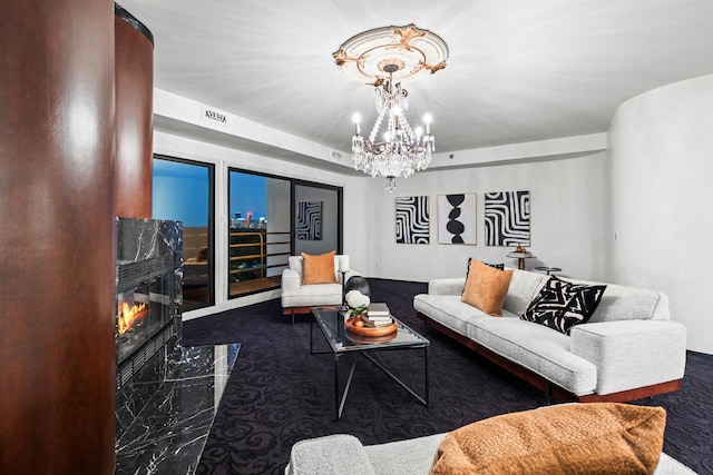 3145 Dean Ct Unit 1100, Minneapolis, MN 55416 - living area featuring a fireplace, a chandelier, and marble tiled flooring