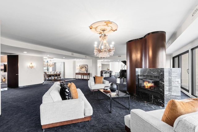 3145 Dean Ct Unit 1100, Minneapolis, MN 55416 - living area featuring a chandelier, a fireplace, carpet, and baseboards