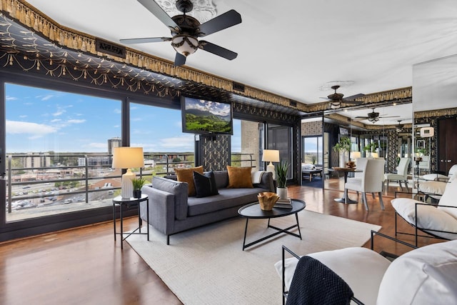 3145 Dean Ct Unit 1100, Minneapolis, MN 55416 - living area featuring a ceiling fan, wood finished floors, and plenty of natural light