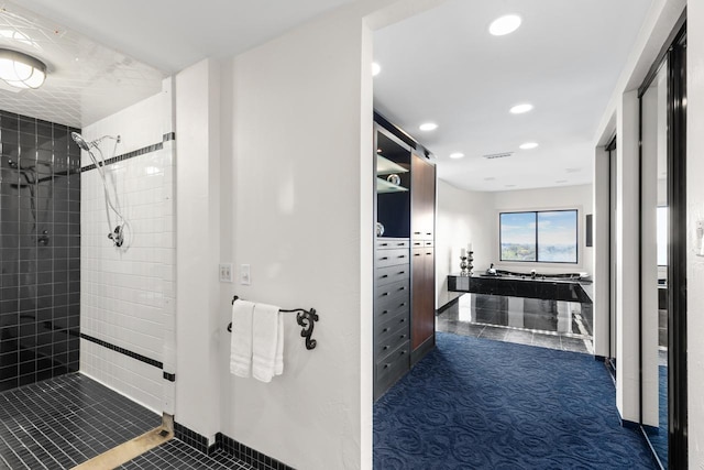 3145 Dean Ct Unit 1100, Minneapolis, MN 55416 - full bath with tiled shower, recessed lighting, and tile patterned flooring