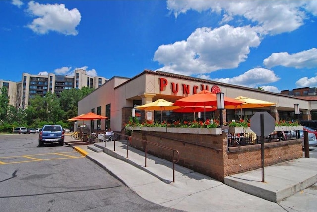 3145 Dean Ct Unit 1100, Minneapolis, MN 55416 - view of building exterior with uncovered parking