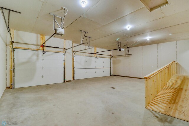 3445 18th St S, Moorhead, MN 56560 - garage featuring a garage door opener
