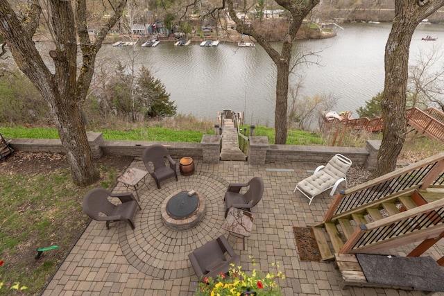 view of patio / terrace featuring a water view